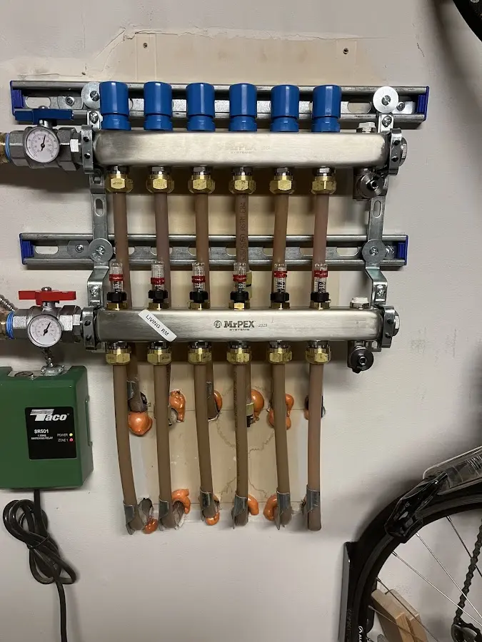 Plumber performing Water Heater Repair at a residential property in Verona